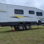 Caravan being lifted by the Redfoot Levelling flip leg system