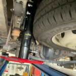 Hydraulic jack attached to chassis of Ford Transit