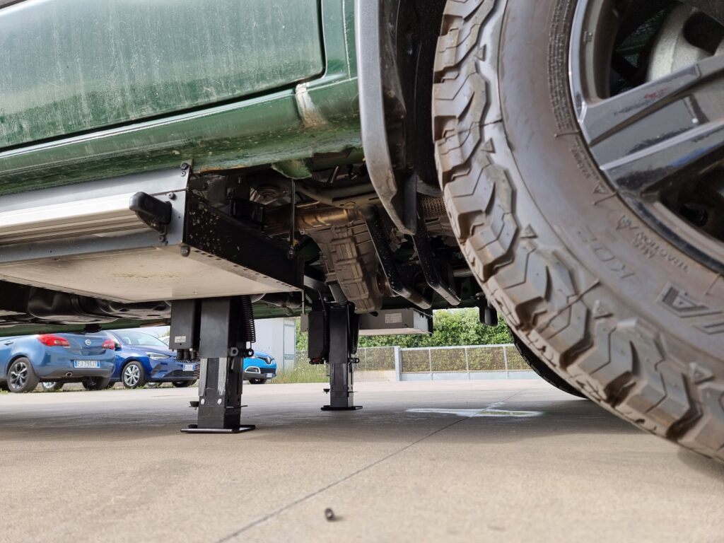 Extended Redfoot jacks on Mercedes Benz van chassis